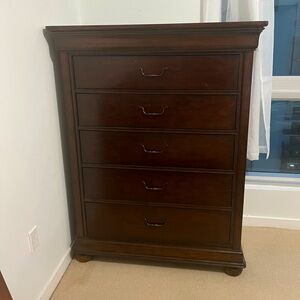 Dresser with 5 and 1/2 drawers. Made of nice wood. Originally $956